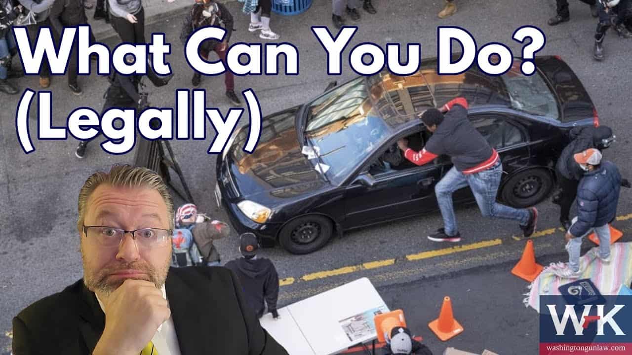 What Can You Do If a Mob Surrounds Your Car?